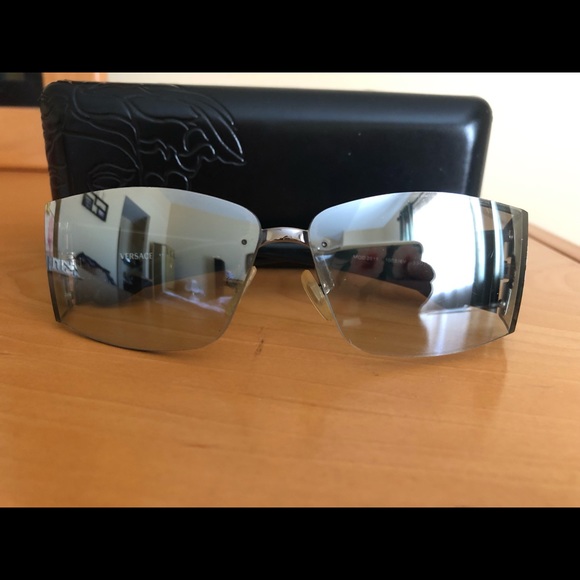 Versace Accessories - Versace mirrored sunnies . Black w silver hardware